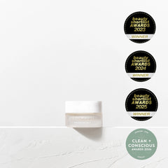 Cosmetic product with multiple award badges on a white background